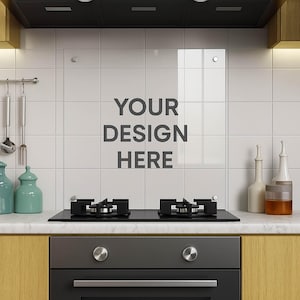 May include: A contemporary kitchen setup with a black hob featuring two burners, a black oven, and a white tiled splashback. The text "YOUR DESIGN HERE" is displayed on the splashback. Kitchen utensils and decorative bottles are also visible.