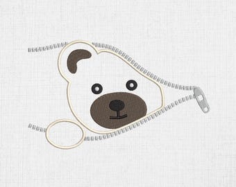 May include: A white bear face peeking out from behind a zipper. The bear has brown eyes, a brown nose, and a brown mouth.