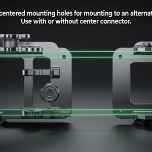 May include: Two dark metallic rectangular mounting frames with centered holes for alternate surface attachment. The text reads: Perfectly centered mounting holes for mounting to an alternate surface. Use with or without center connector.