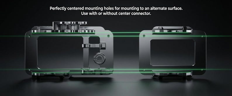 May include: Two dark metallic rectangular mounting frames with centered holes for alternate surface attachment. The text reads: Perfectly centered mounting holes for mounting to an alternate surface. Use with or without center connector.