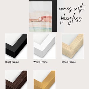a collection of framed paper prints, each with a different frame color and style, including black, white, wood, dark wood, gold, and wood.