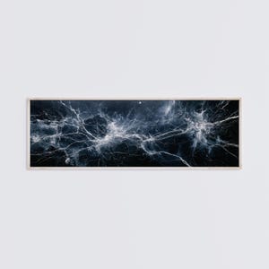 May include: A rectangular wall art piece featuring a dark navy blue and black background with intricate, branching white lines that resemble lightning or neural networks, all encased within a thin, light-colored wooden frame.