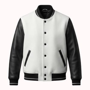 May include: A varsity jacket featuring a white wool-blend body and black leather sleeves. The garment includes a black ribbed collar, cuffs, and hem with white stripes, a front snap-button closure, and two side pockets with black leather trim.