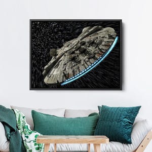 May include: A black and white image of the Millennium Falcon spaceship from Star Wars flying through space. The spaceship is surrounded by a blue light trail and a dark background with stars.