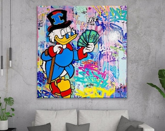 May include: A cartoon duck wearing a top hat and holding a stack of money. The duck is standing on a colorful background with graffiti-style writing and designs. The text "BE FREE" and "TAT" are visible in the background.