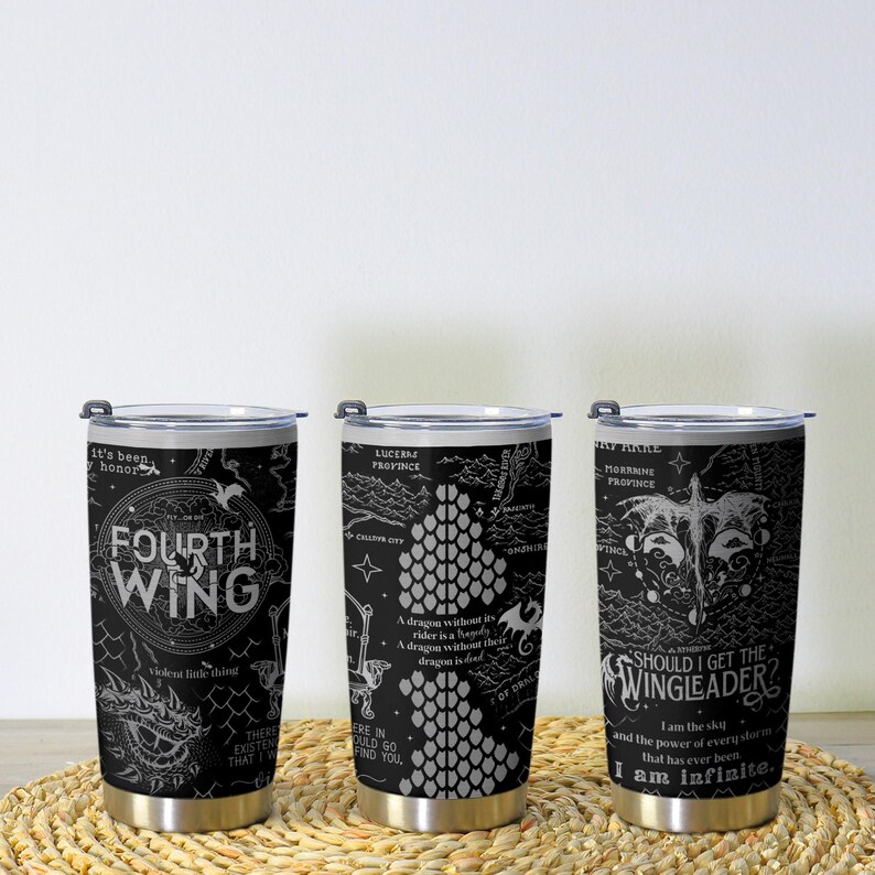 May include: Three black insulated tumblers with silver lids and bases. Each tumbler features a white graphic design and text. One says "FOURTH WING", another has a dragon scale pattern, and the third says "SHOULD I GET THE WINGLEADER?"