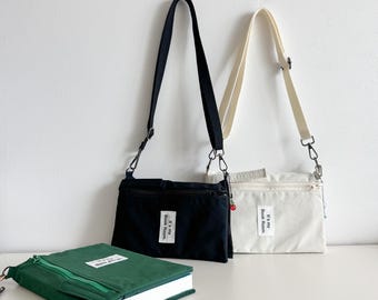 Funda de tela impermeable con bolsillo para libros, reutilizable