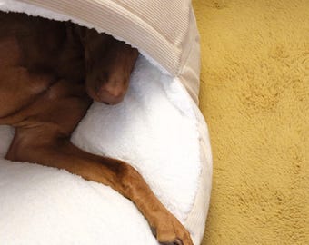 Luxury cosy 65cm dog cave bed, handmade with quality corduroy and fleece. Zip fastening washable cover & removable hypoallergenic filling.