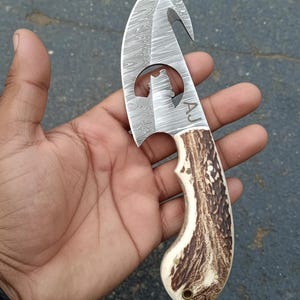 Gut Hook Knife with Stag Horn Handle, Damascus Steel Blade and Leather Sheath