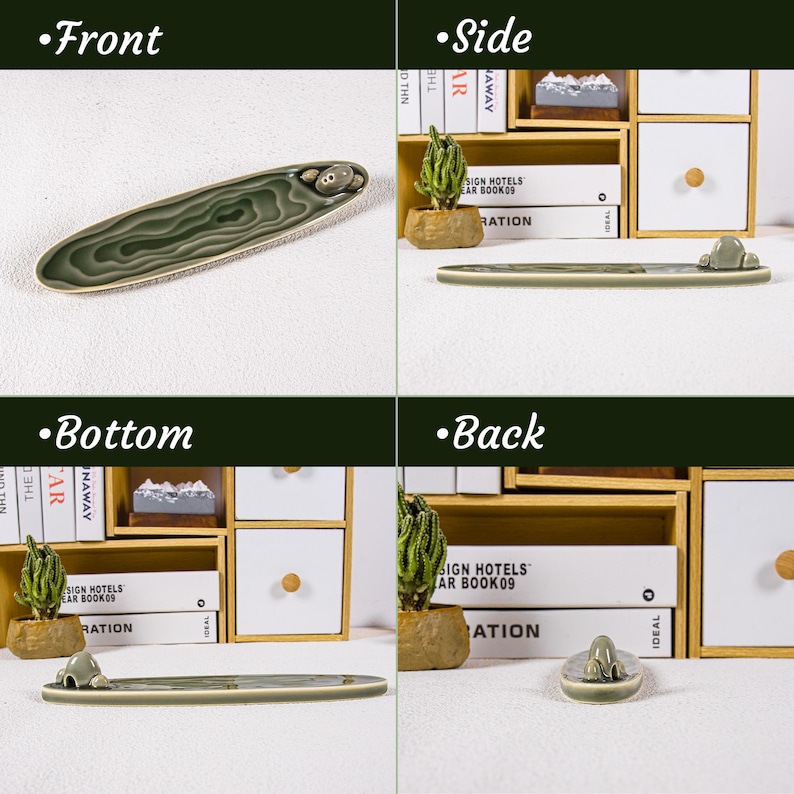 May include: A green ceramic incense holder with a layered design and a small frog figurine. The holder is oval-shaped and has a textured surface. The frog is light gray. The incense holder is approximately 10 inches long.