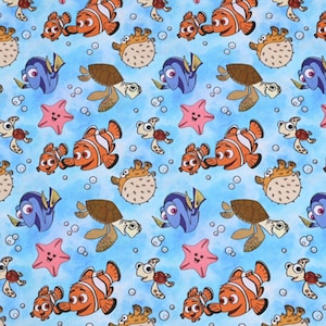 May include: A repeating pattern featuring cartoon characters from the movie "Finding Nemo" on a light blue background. The design includes orange and white clownfish, blue tangs, sea turtles, starfish, and pufferfish, with bubbles scattered throughout.