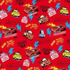 May include: A vibrant red background featuring a repeating pattern of animated cars, including Lightning McQueen, Tow Mater, and Luigi. The design incorporates lightning bolts, flames, and text elements like "Radiator Springs Curios" and "Tow Mater".