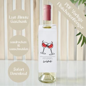 May include: Printable wine bottle gift tag with a red wine glass graphic and the text "Happy Birthday to my partner in wine".