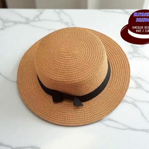 Flat Top Sun Hat | Ladies Straw Cap with Bow Detail | Relaxed Outdoor Protection Headwear | Brimmed Summer Fashion Accessory