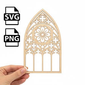 May include: A laser-cut wooden gothic window design with intricate floral and geometric patterns. The window features a central circular design and three lower arched panels. The image also includes SVG and PNG file type icons.
