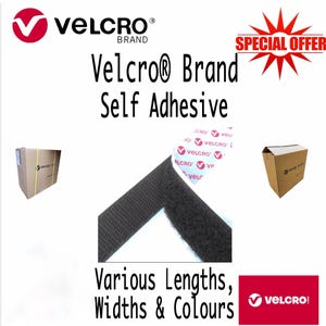 May include: Black Velcro brand self-adhesive hook and loop tape. The tape is shown folded in a corner. The packaging is visible in the background. The text "VELCRO® Brand Self Adhesive" is visible in the image. The text "Various Lengths, Widths & Colours" is visible in the image.