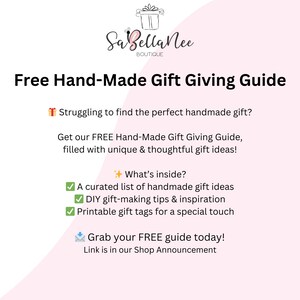 May include: A pink and white graphic with the text "Sa Bella Nee Boutique" and the text "Free Hand-Made Gift Giving Guide". The graphic includes a gift box icon, a gift tag icon, and a check mark icon. The text "Struggling to find the perfect handmade gift?" is also included. The text "Get our FREE Hand-Made Gift Giving Guide, filled with unique & thoughtful gift ideas!" is also included. The text "What's inside?" is also included. The text "A curated list of handmade gift ideas" is also included. The text "DIY gift-making tips & inspiration" is also included. The text "Printable gift tags for a special touch" is also included. The text "Grab your FREE guide today!" is also included. The text "Link is in our Shop Announcement" is also included.