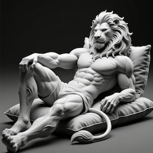 May include: A monochrome sculpture of a lion-human hybrid reclining on a pillow. The figure has a lion's head with a flowing mane and a human body, wearing shorts. The sculpture is detailed and appears to be made of a smooth material.