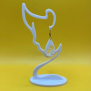 White dangling earrings