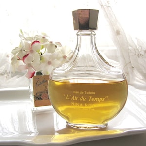 Perfume L’air du Temps Nina Ricci LARGE 3.3 oz Eau de Toilette Lalique Bottle Vintage