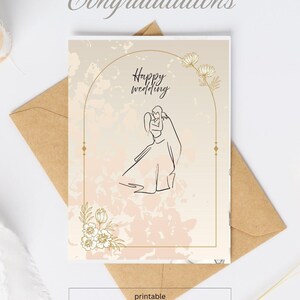 Pode incluir: Cartão de felicitações de casamento com as palavras "Parabéns" e "Feliz casamento". O cartão apresenta um desenho a traço de um casal a abraçar-se, com detalhes florais e geométricos. A palavra "imprimível" está na parte inferior.