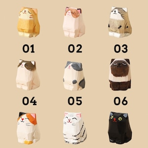 May include: Nine wooden cat figurines with different colors and patterns, each with a unique expression. The text "Only Cats" is at the top, with numbers 01 through 09 below each cat.