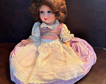 Internationally dressed 18 inch doll