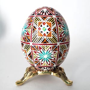 Pysanka Ukrainian Easter egg ornament hand-painted real chicken eggshell, fancy floral Pysanka red flowers blue stars patterns design egg