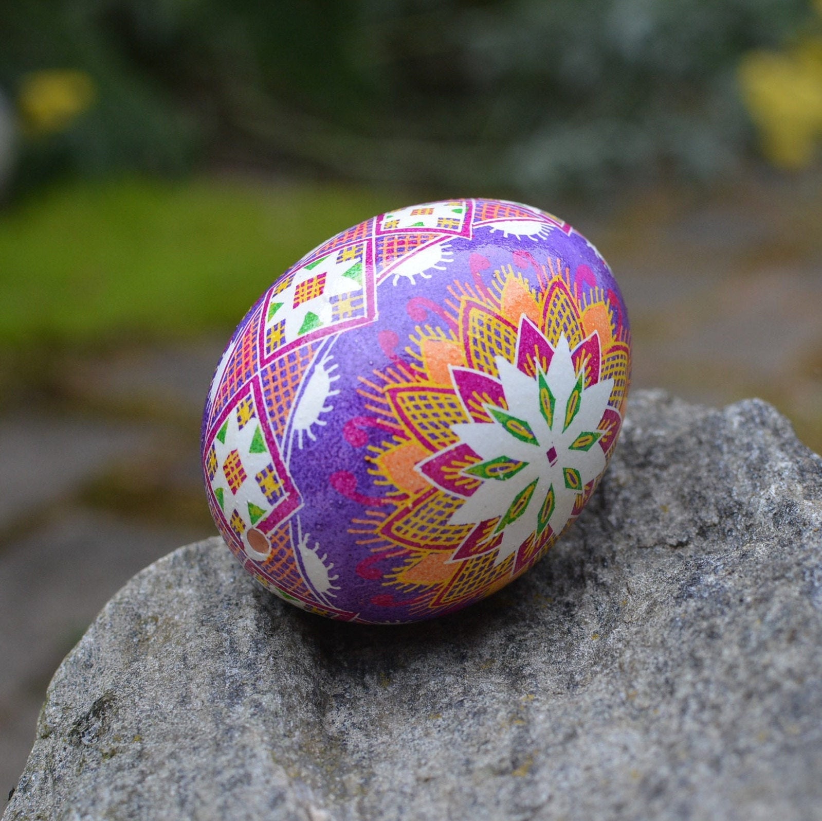 Lviv, Ukraine. 06th Apr, 2023. A young woman makes Easter eggs. A young  woman in traditional Ukrainian clothing makes Easter eggs using ancient  technology. Pysanka is an ancient tradition, one of the