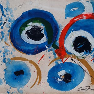 May include: Abstract artwork with vibrant colours. Displays large circular forms in blue, red, and white, with black centres, and green and gold accents. Splatter effects in blue and red add texture. Signed "Sam Francis" in the bottom right corner.