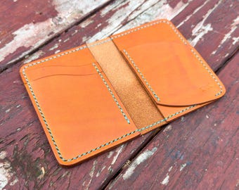 Handmade Leather Bifold Wallet: Minimalist Ocelot Design