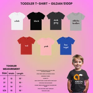 May include: Image of a range of toddler t-shirts in colours including white, black, dark grey, athletic heather, red, pink, and true royal. The image includes a size chart with measurements in inches, equivalent to cm, and the text "TODDLER T-SHIRT - GILDAN 5100P".