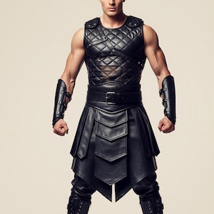 May include: Black leather armor set featuring a quilted vest, belt, and layered skirt. The set includes matching arm guards and is worn with black pants and boots. The outfit has a medieval or fantasy theme.