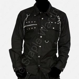 May include: Black button-down shirt with long sleeves, featuring silver chain accents, a zippered chest pocket, and studded details. The shirt has a classic collar and is designed with a gothic or alternative aesthetic.