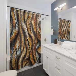 May include: A shower curtain with a repeating pattern resembling snake scales. The design features shades of brown, gold, and black, creating a textured, organic look. The curtain hangs in a bathroom setting, adding a unique decorative element.