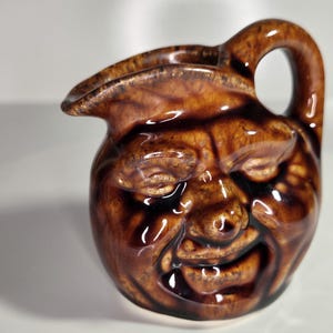 Vintage Pottery “Man in the Moon” Brown Creamer | 3"