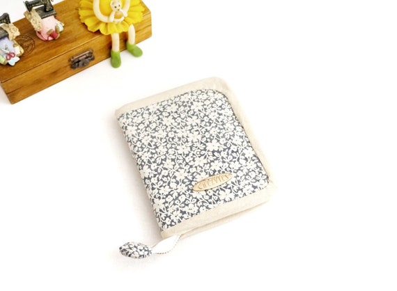 cream bifold wallet