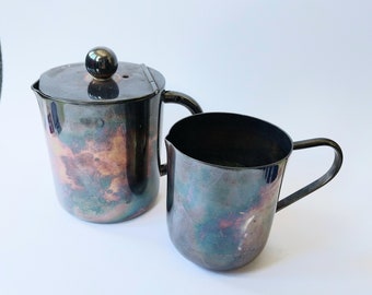 Silverplated one cup teapot and milk jug silverplated set