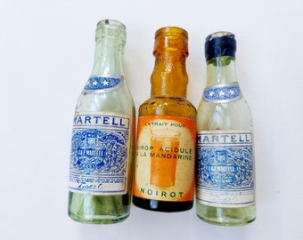 3 small french bottles