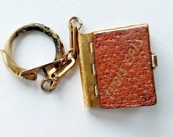 Religious souvenir book on keyring