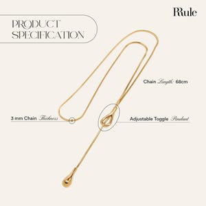 Adjustable knot layered necklace with a Y-lariat drop chain and a gold or silver toggle pendant. Versatile design can be worn long, as a choker, or layered with other necklaces. A minimalist long drop chain necklace perfect for everyday wear, Thanksgiving gatherings, Christmas parties, New Year celebrations, and holiday gifting.