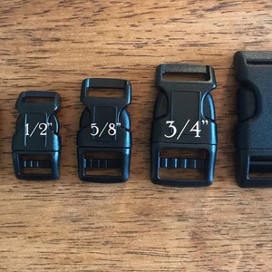May include: Five black plastic side release buckles in different sizes: 3/8 inch, 1/2 inch, 5/8 inch, 3/4 inch, and 1 inch.