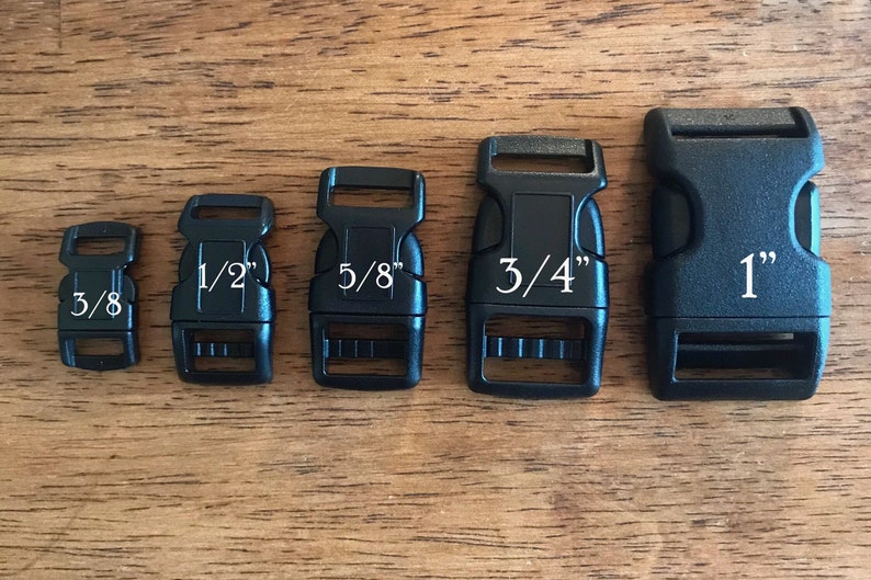 May include: Five black plastic side release buckles in different sizes: 3/8 inch, 1/2 inch, 5/8 inch, 3/4 inch, and 1 inch.