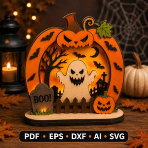 May include: A layered wooden Halloween decoration featuring a large orange pumpkin frame with bats, a central white ghost, a tombstone with the text BOO!, a small jack-o'-lantern, a fence, and a silhouette of a tree and house against a glowing background.