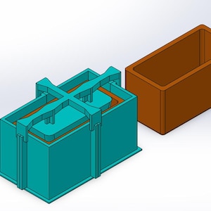 Peut inclure: Image en rendu 3D d'un moule rectangulaire turquoise avec un intérieur marron et un récipient rectangulaire marron séparé. Le moule a une structure en forme de croix sur le dessus, conçu pour un usage spécifique.