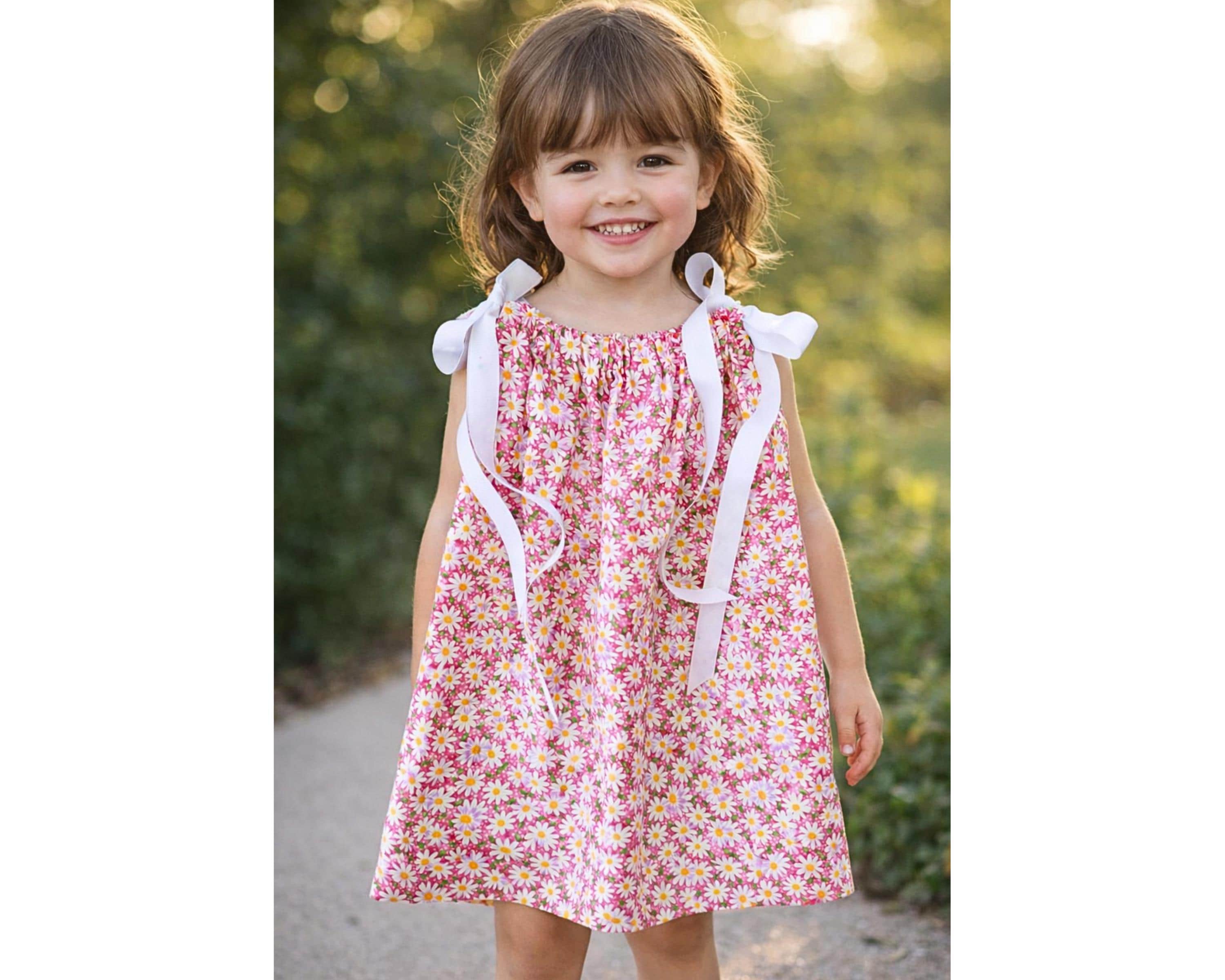 20 Baby Dress Designs for Summer That Are Actually Soft Enough to Wear 3 Pink Daisy Pillowcase Dress for Baby and Toddler Girls