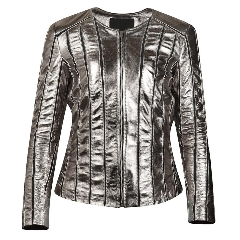May include: Silver metallic jacket with vertical black stripes and a full-length zipper. The jacket has a round neckline and long sleeves. The material has a shiny, textured appearance. The jacket is a stylish outerwear garment.