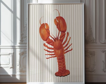 May include: A framed art print featuring a detailed illustration of a vibrant orange lobster. The crustacean is centered against a backdrop of vertical beige and white stripes. The artwork is displayed in a white frame, adding a touch of elegance.