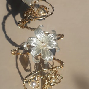 Pearlescent flower cuff bracelet