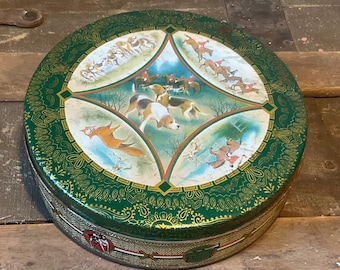 Vintage unbranded English fox hunt tin, hunting hounds, steeple chase, equestrian themed biscuit/cookie metal lidded tin for decor, storage.